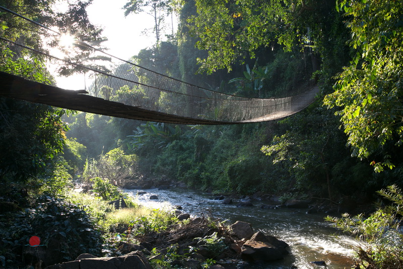 Suspension bridge to Kanchanh waterfalls
